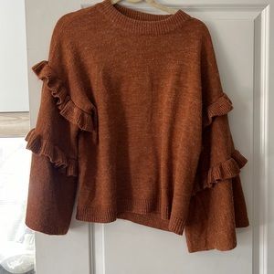 Orange ruffle sleeve sweater